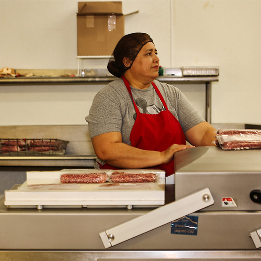woman-packing-meat.jpg
